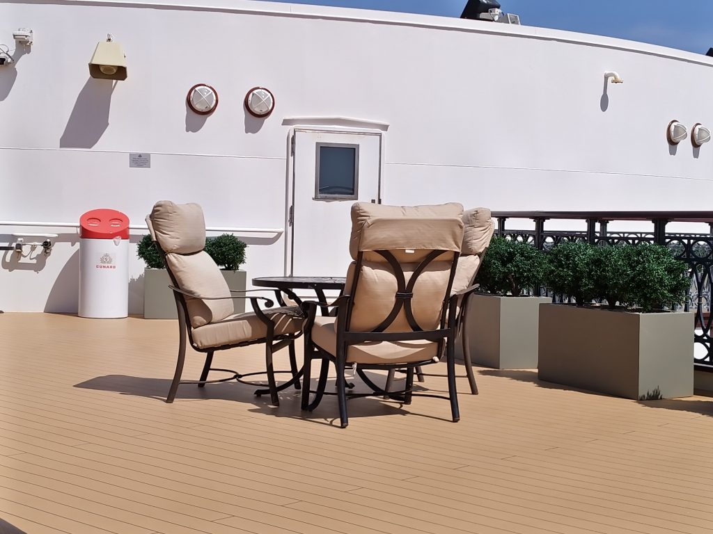 Table on he Grills deck in the sun